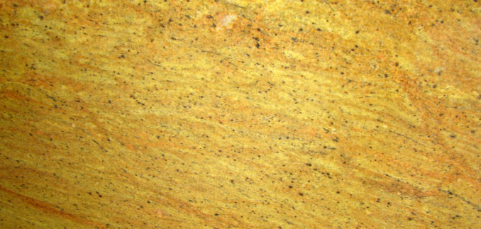 Madhura Gold — natural stone slab for custom countertops and tables
